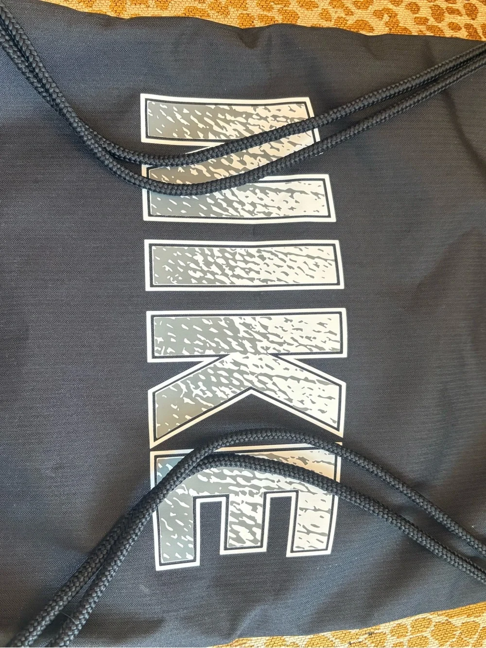 Nike Black Drawstring Backpack with White Logo